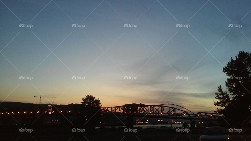 Bridge City Sunset. The developing Portland skyline as seen from the East bank of the Willamette River at sunset.