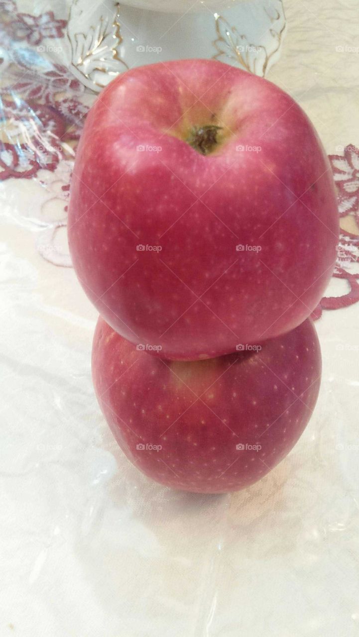 Two red apples