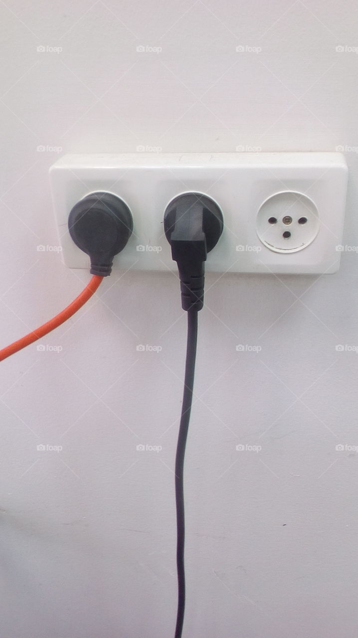 Socket on white wall