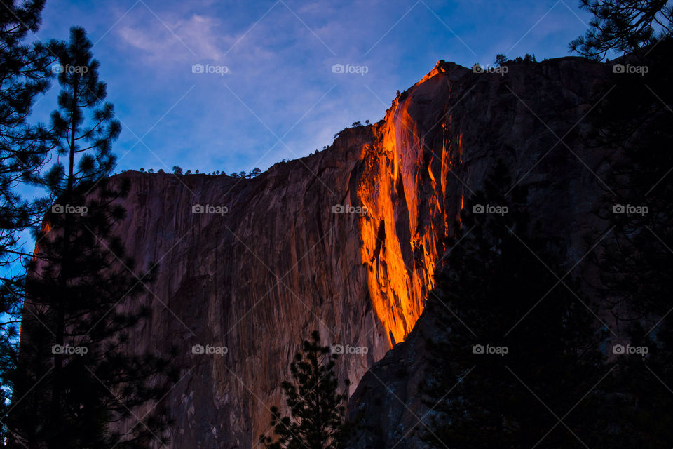 Horsetail fall lit up during sunset