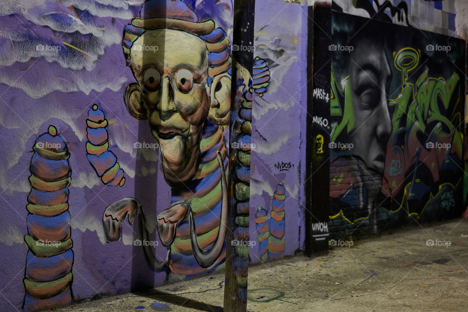 Night lights over a Graffiti Wall