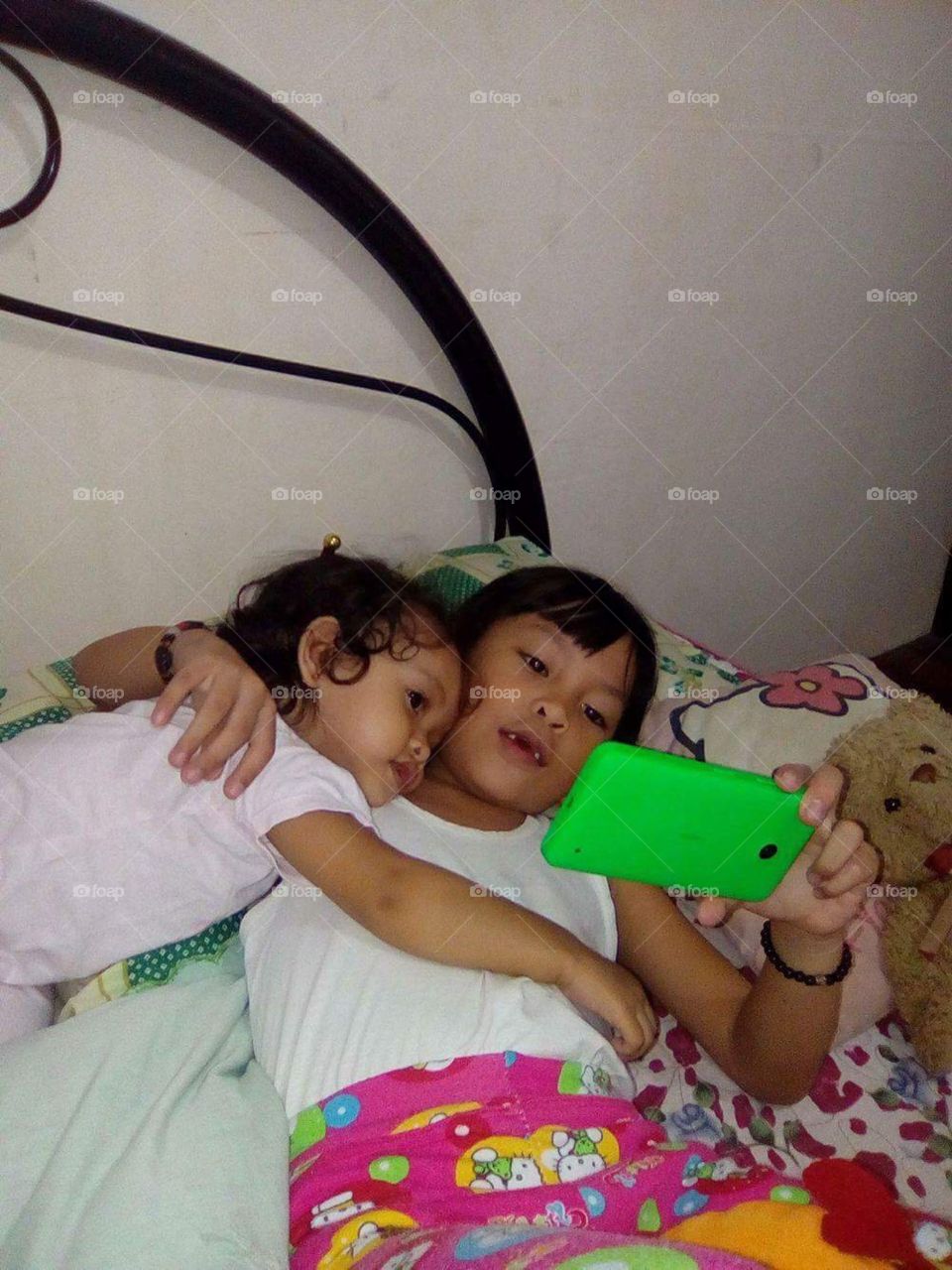 Two of our children relaxing at home in the Philippines
