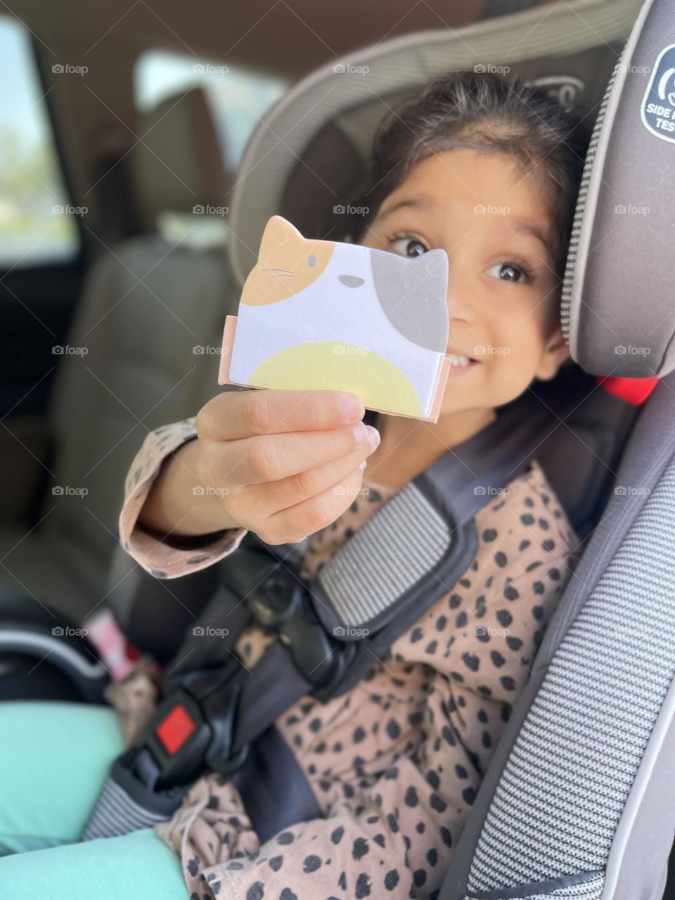 Little girl excited about cats, smiling for her cat loving camera pic, little girl is obsessed with cats, fun cat times for kids 