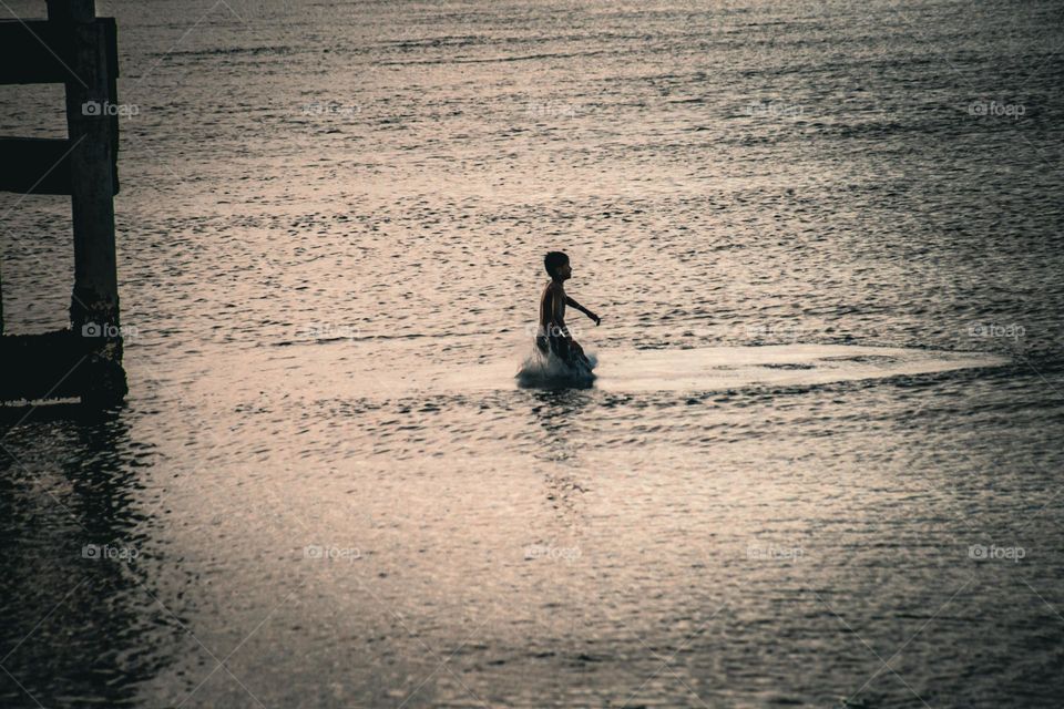 Kids falls on the water