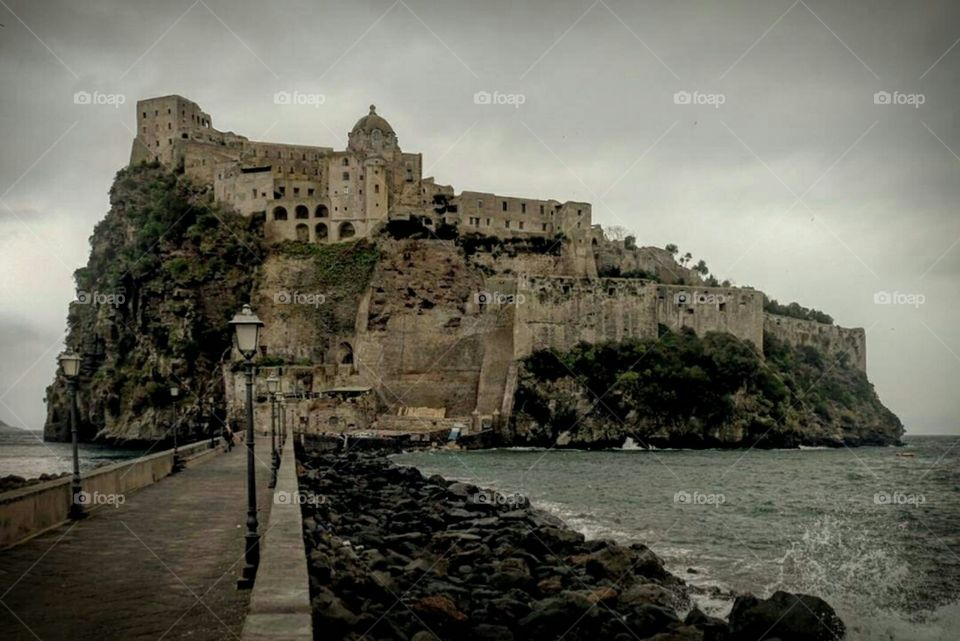 The Castello Aragonese, built in 474 BC, stands on a mass of volcanic rock and is connected to the island of Ischia by a stone seaway, built more recently though, only in 1438