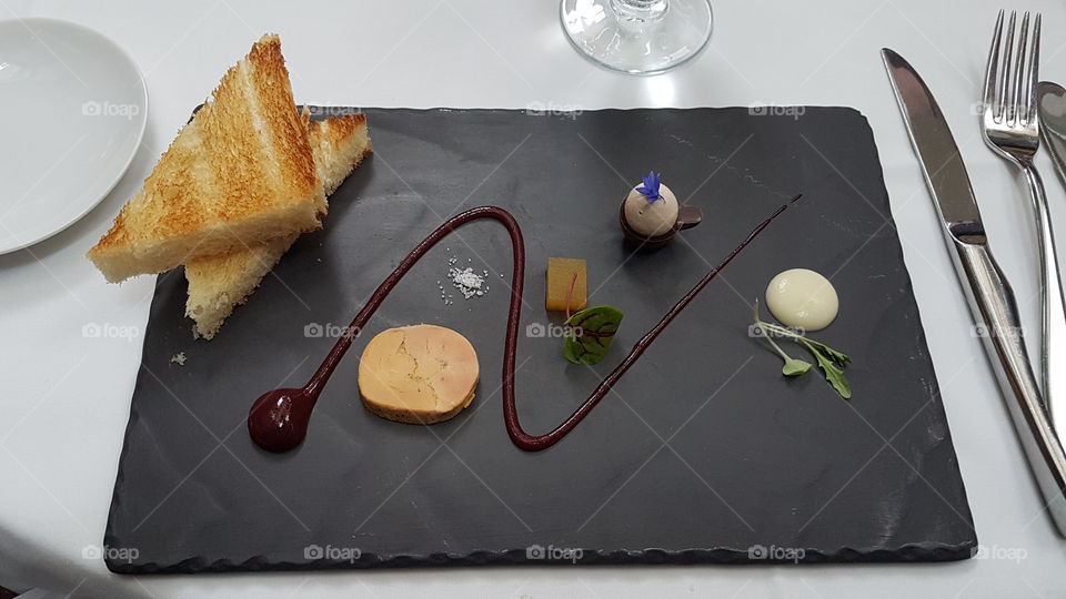 Foie gras en torchon and foie gras with coffee cream and chocolate. Fine gatronomy in Quebec city at the Saint-Amour restaurant. Québec, Canada.