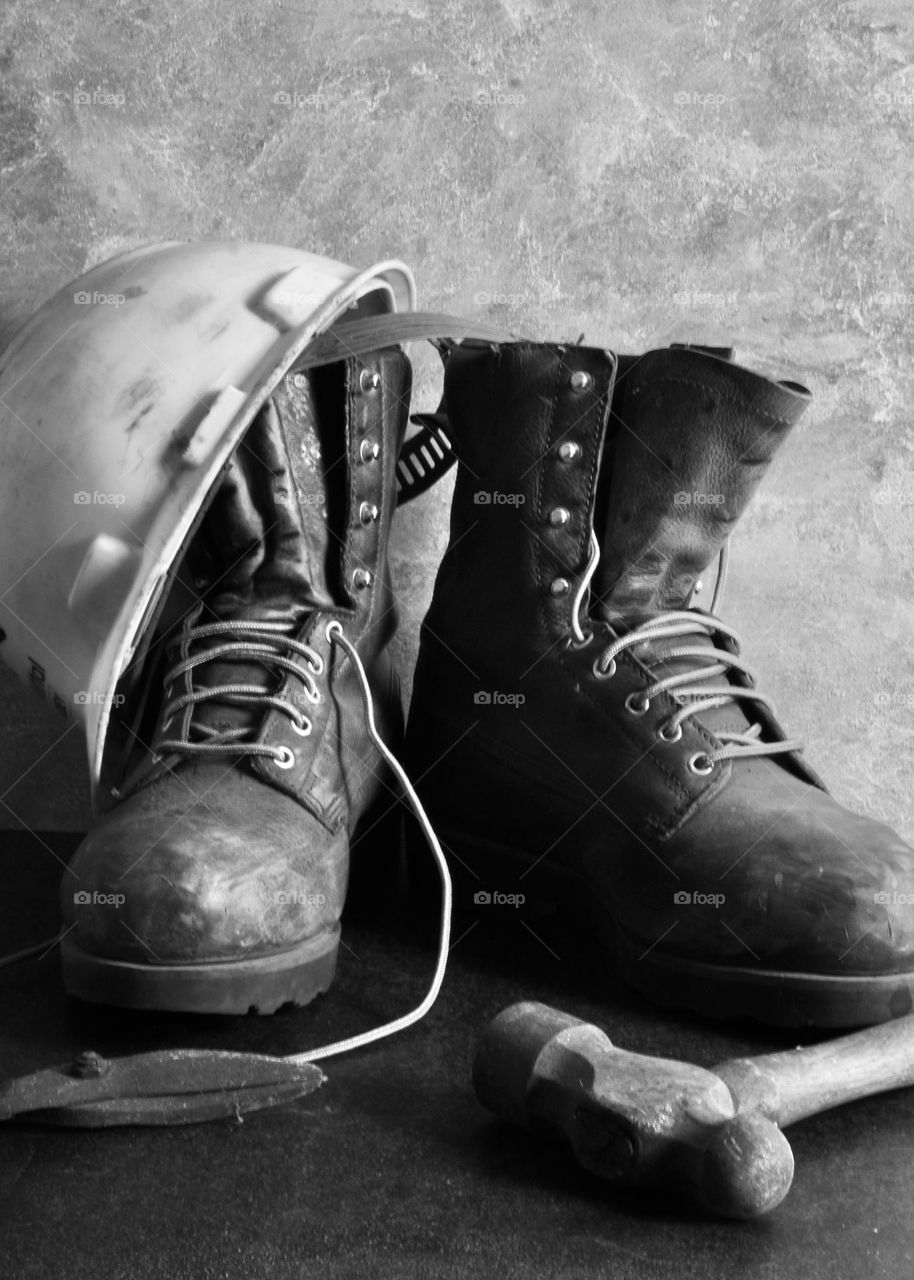 Work boots and work hat in black and white 