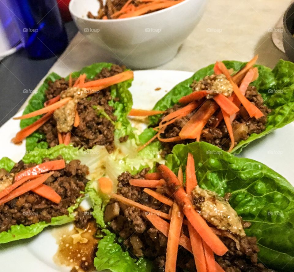 Healthy eating with Asian style pork lettuce wraps