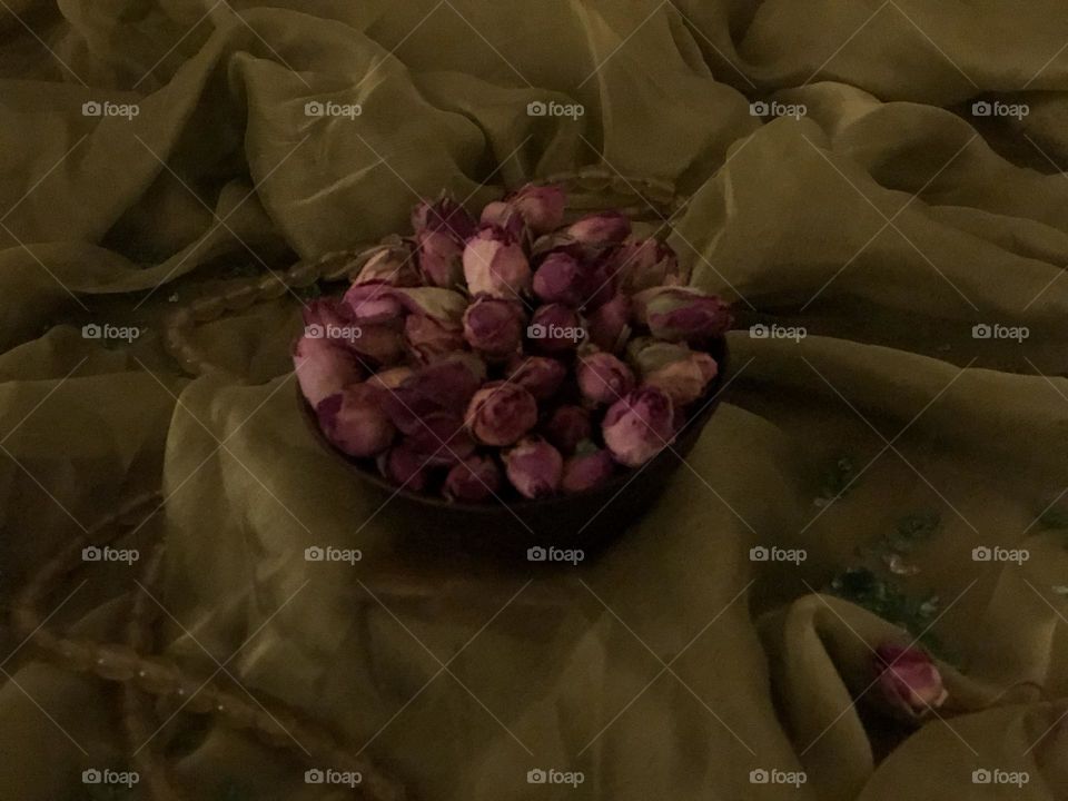 We were all fast sleep, and no one heard angels' footsteps when they brought us Damask roses.