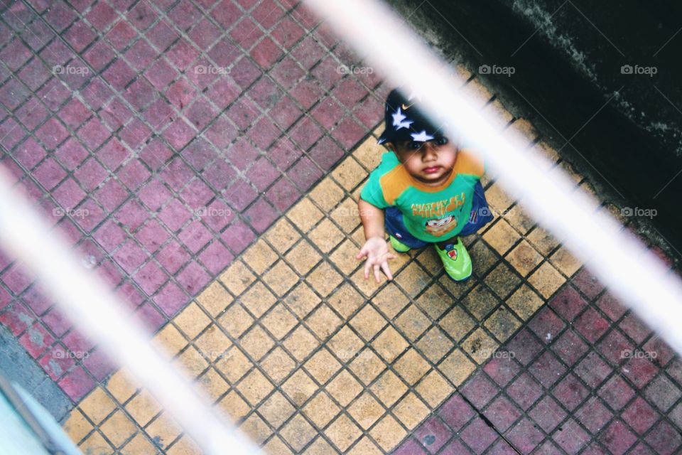 Cute little guy in his tiny shoes