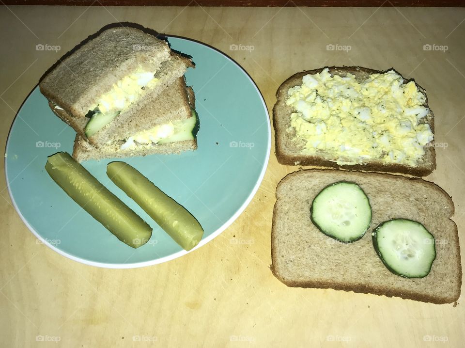 Egg salad Sandwich with cucumbers and pickles 