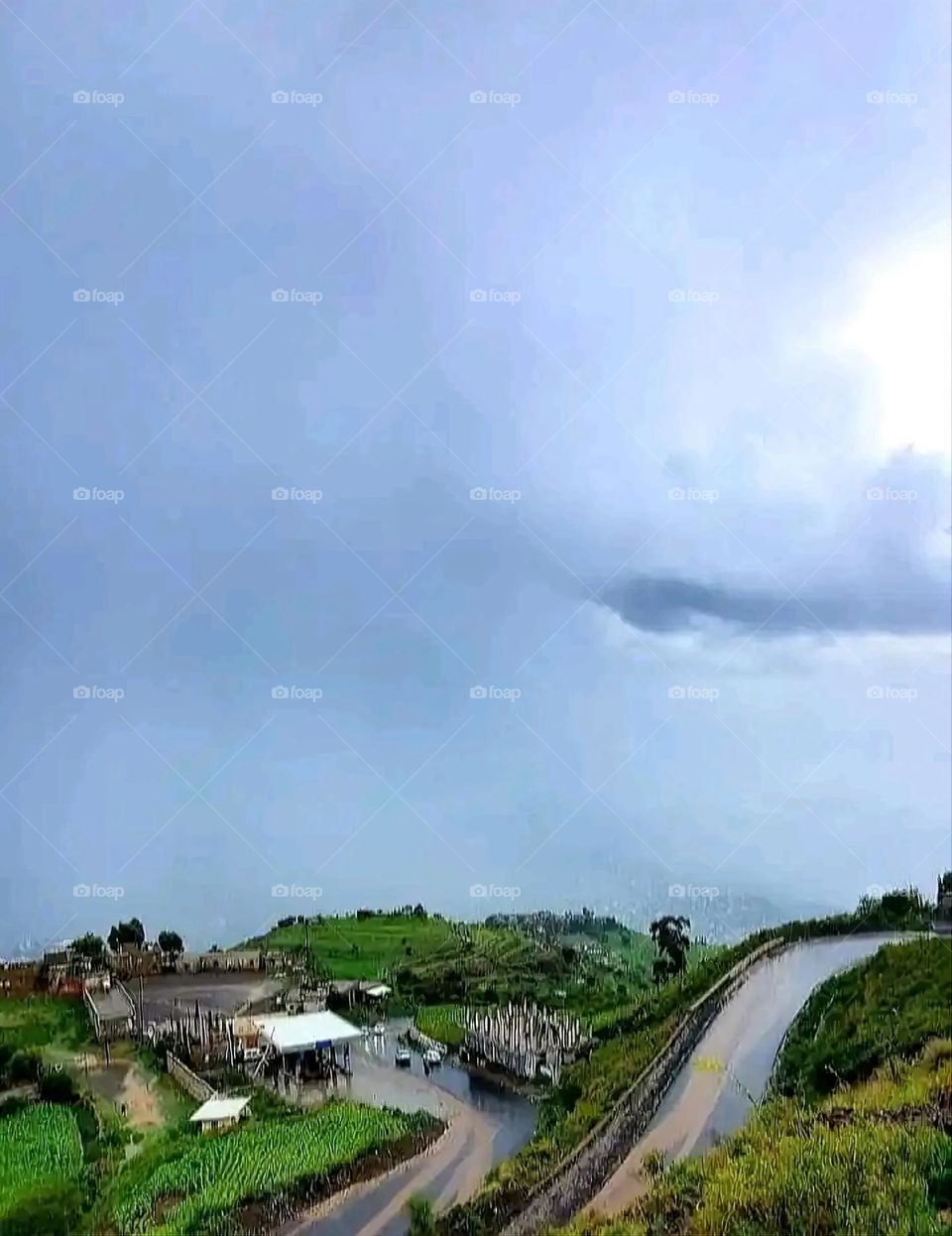 Glory be to God, the magnificent and picturesque view and the natural green trees are a view that is nothing more wonderful than it