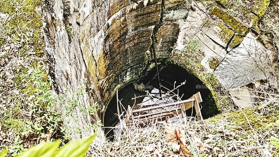 Abandoned. An old water silo at a dam from the early 1900's along the youghiogheny river where they would fill the steam engines. It was blown up about 1960 because they were worried about flooding