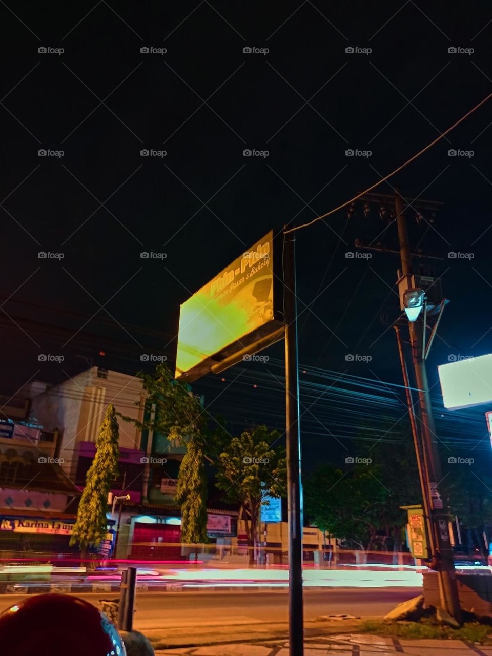 Defocused abstract background of city street at night with street lamp lighting. 
Blurred cityscape,Lighting night at tourist attraction colorful.