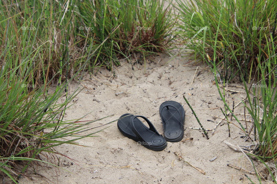 Totes sandals at beach