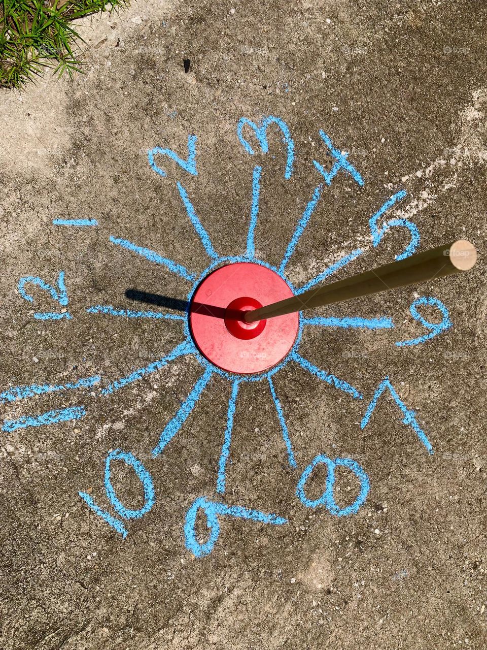 Shadow Clock Handwritten With Chalk Telling Time With The Sun Position Through The Day.