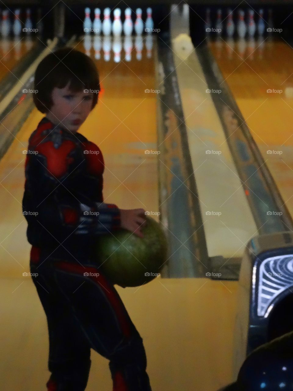 Boy In Bowling Alley
