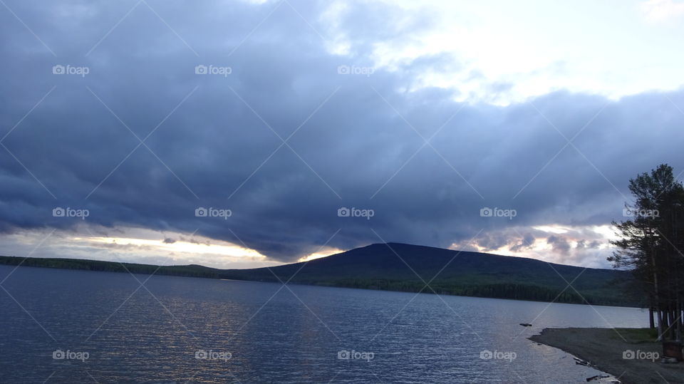 severe Ural mountains, cold summer, a powerful cyclone