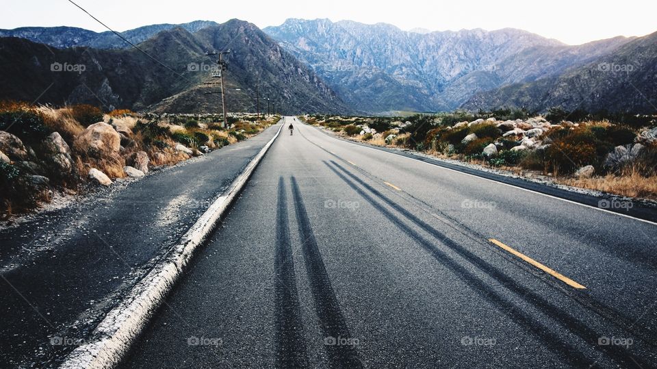mountain range and empty road