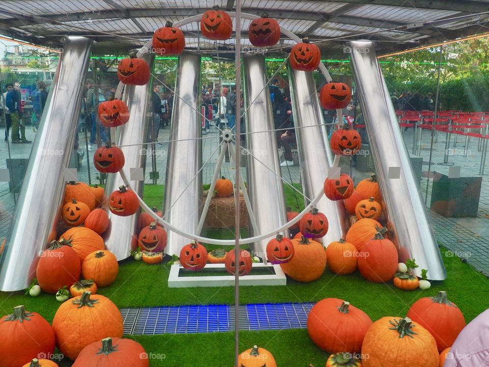 Pumpkins in miniature model of London eye for Halloween.