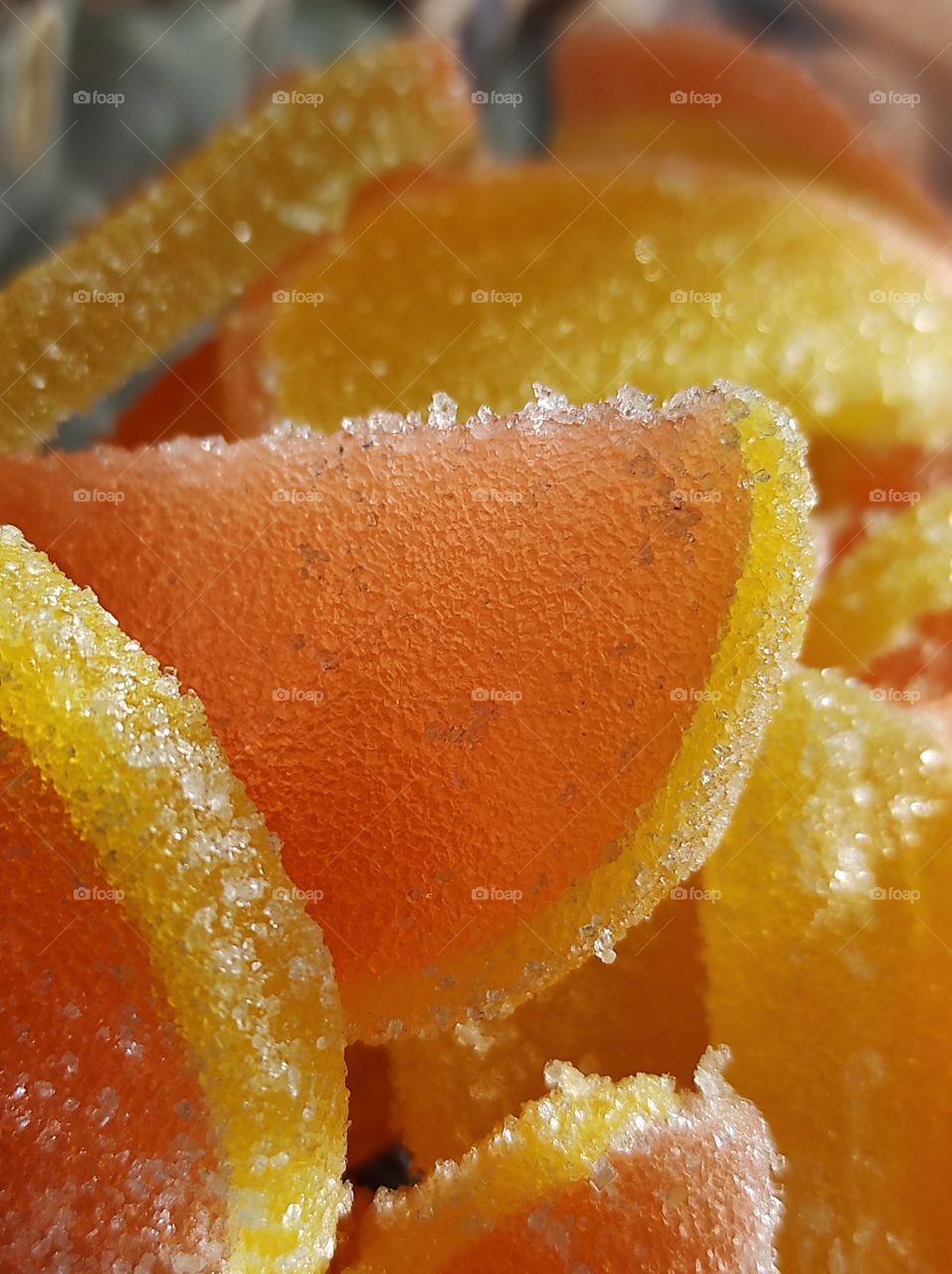Fruit jelly in the form of citrus fruits close-up