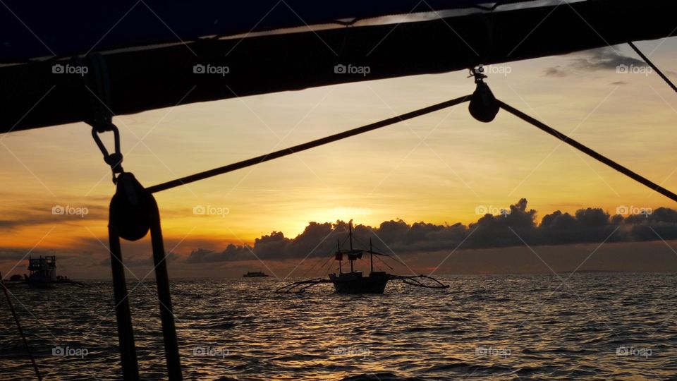 sailing at sunset