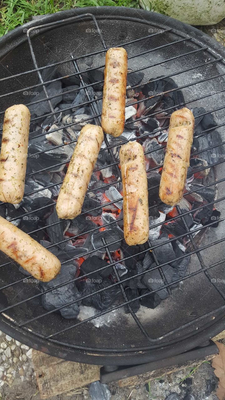 Tasty barbecue sausages on the barbecue, pork. Very nice to also eat peanut sauce with it.