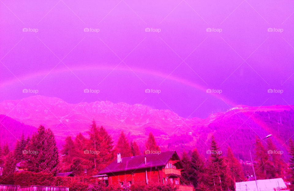 rainbow in the mountains by swisstraveler