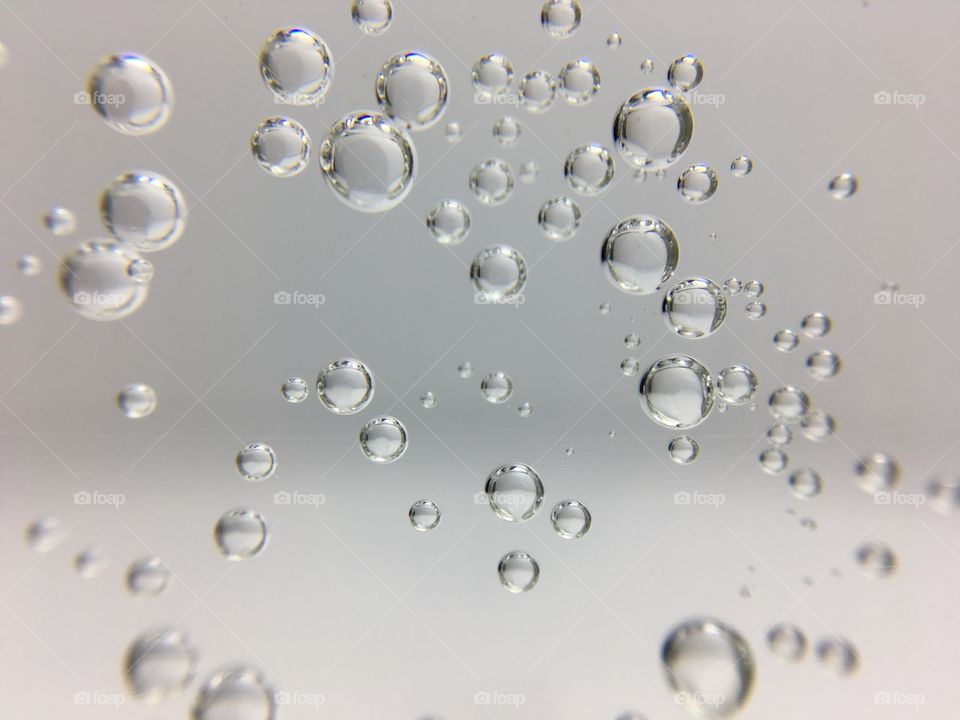 Bubbles Floating in a Cleat Glass