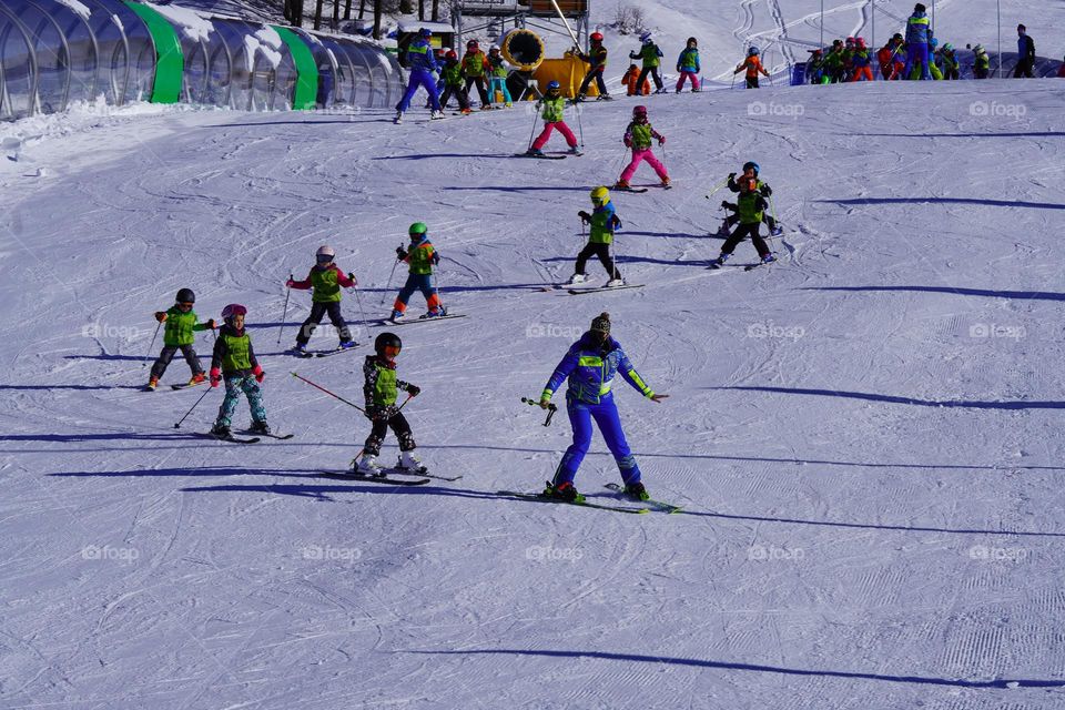 kids are skiing 