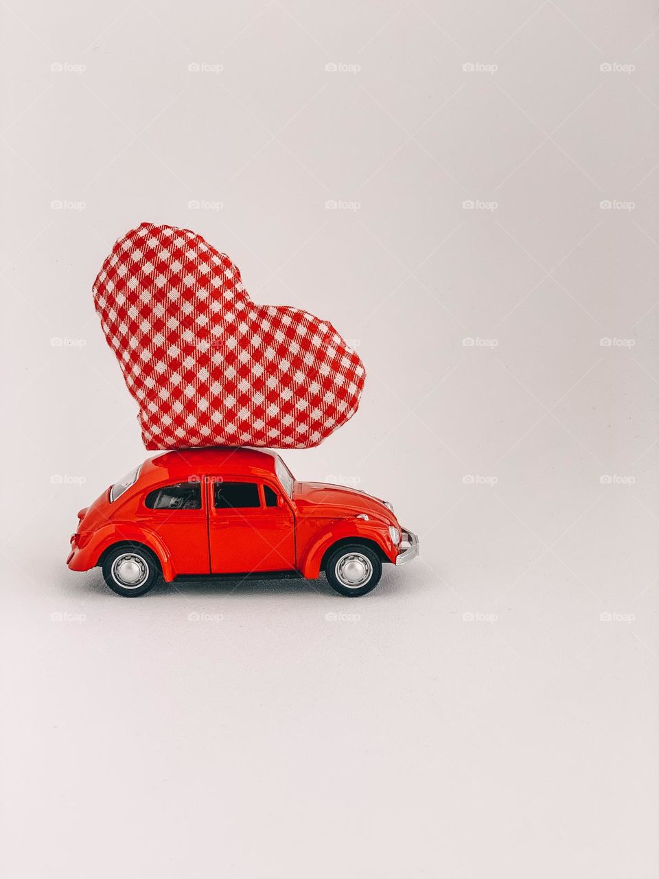 Metal red car with heart