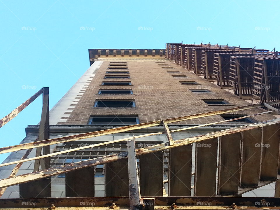 Below the fire escape