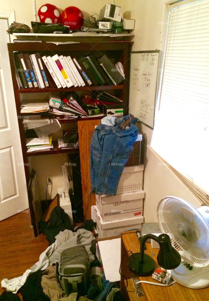 A corner area of a room that is supposed to be dedicated office space. It belongs to a family member who admits to being " a bit " of a slob. I beg to differ. I'm a neat freak and it kills me not to go in there to clean and organize this atrocity, however, I avoid this area and just keep the door so it can't be seen!! I have my own office space that I keep for myself. And you can bet it's well organized, neat and tidy.