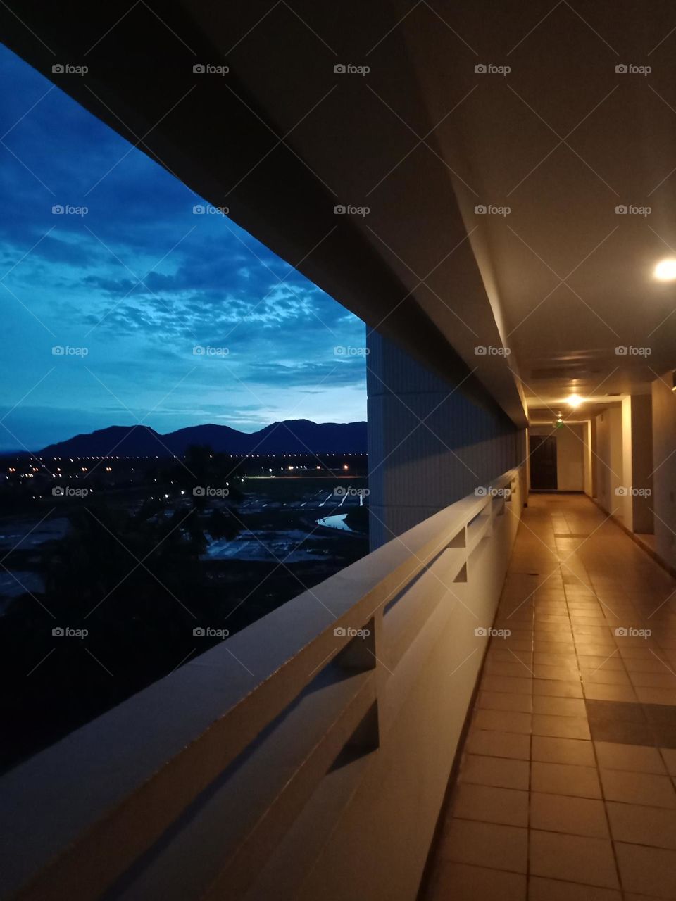 Night corridor with dark mountain view