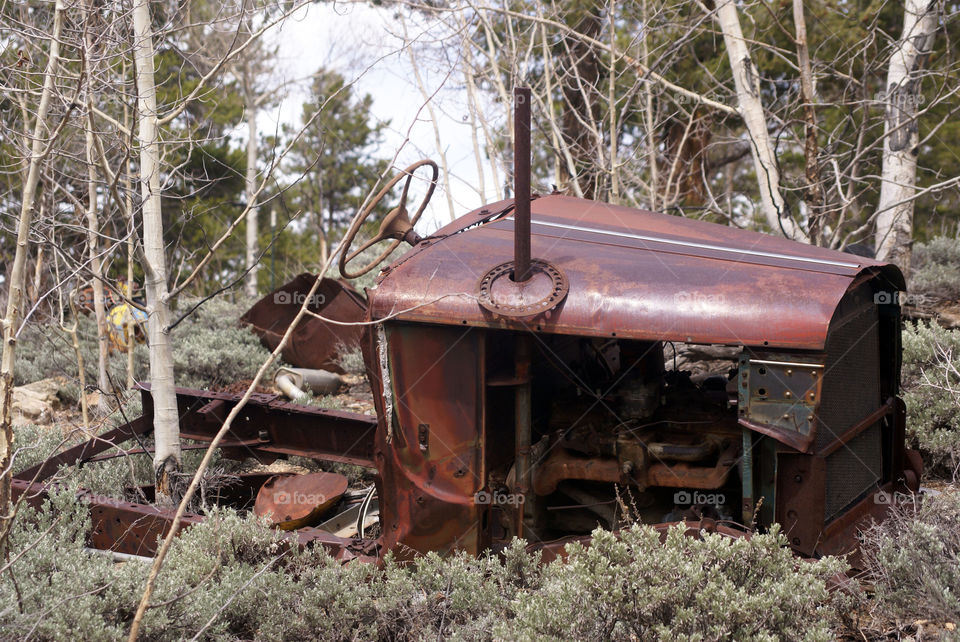 Colorado mining scene. An old car once provided power to lift gold ore out of a Colorado mine