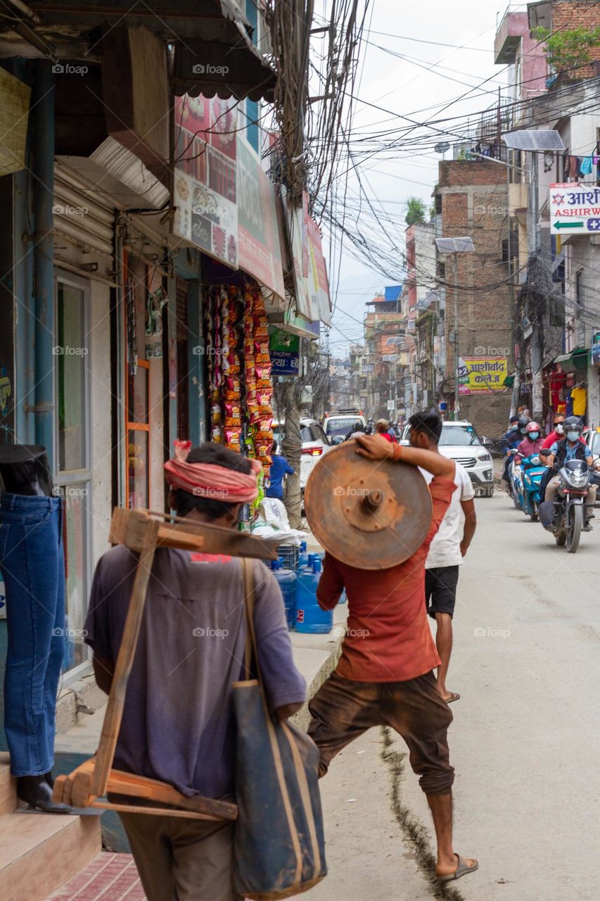 Authentic workers living their life in the streets of Kathmandu, Nepal. 