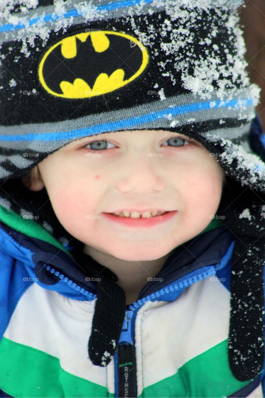 Smiling boy in warm clothing