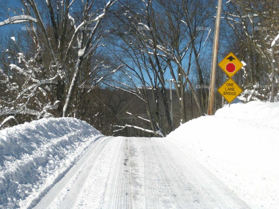 snow covered rural road in wintertime