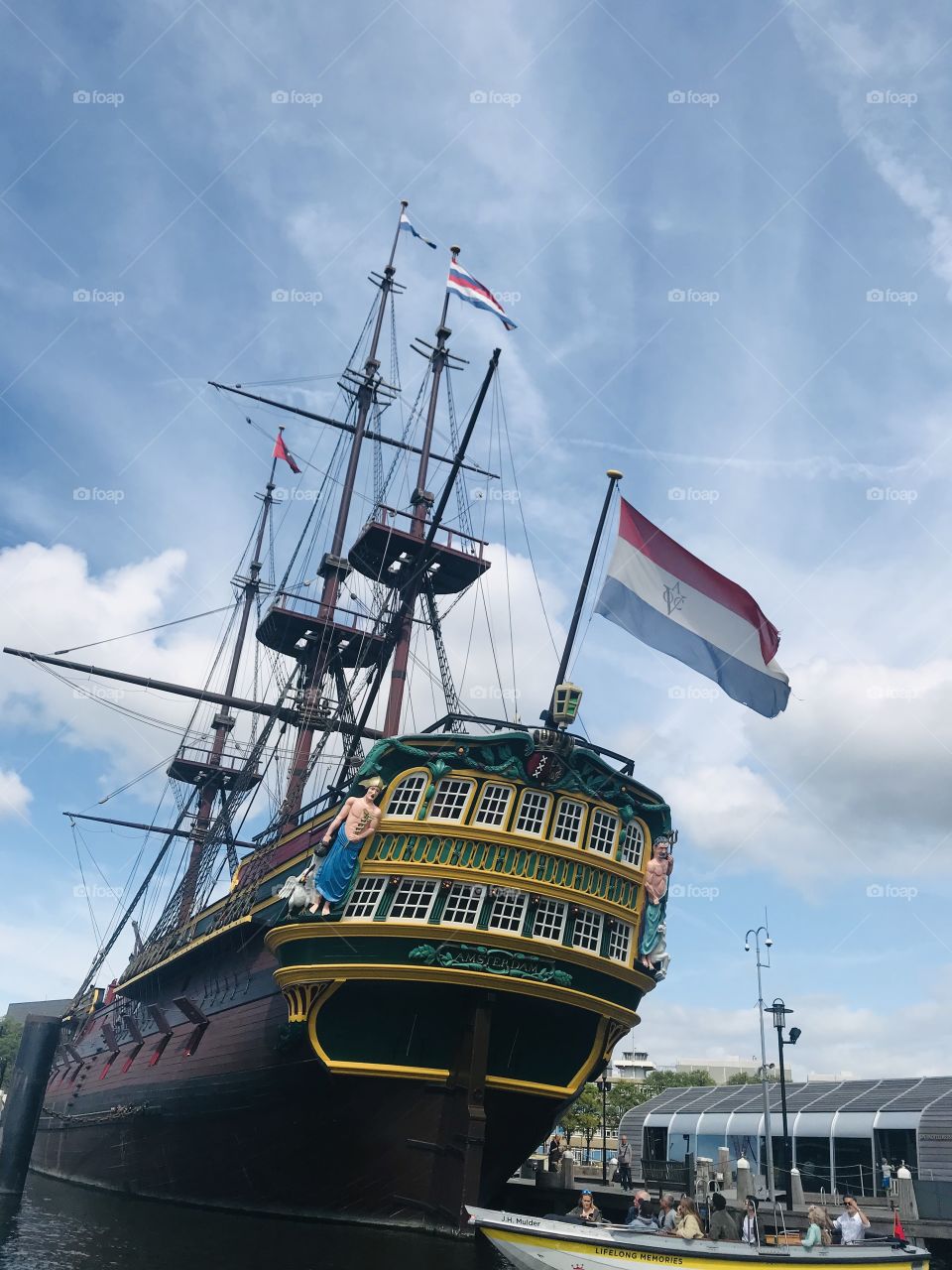 Beautiful boat in the canal of Amsterdam.