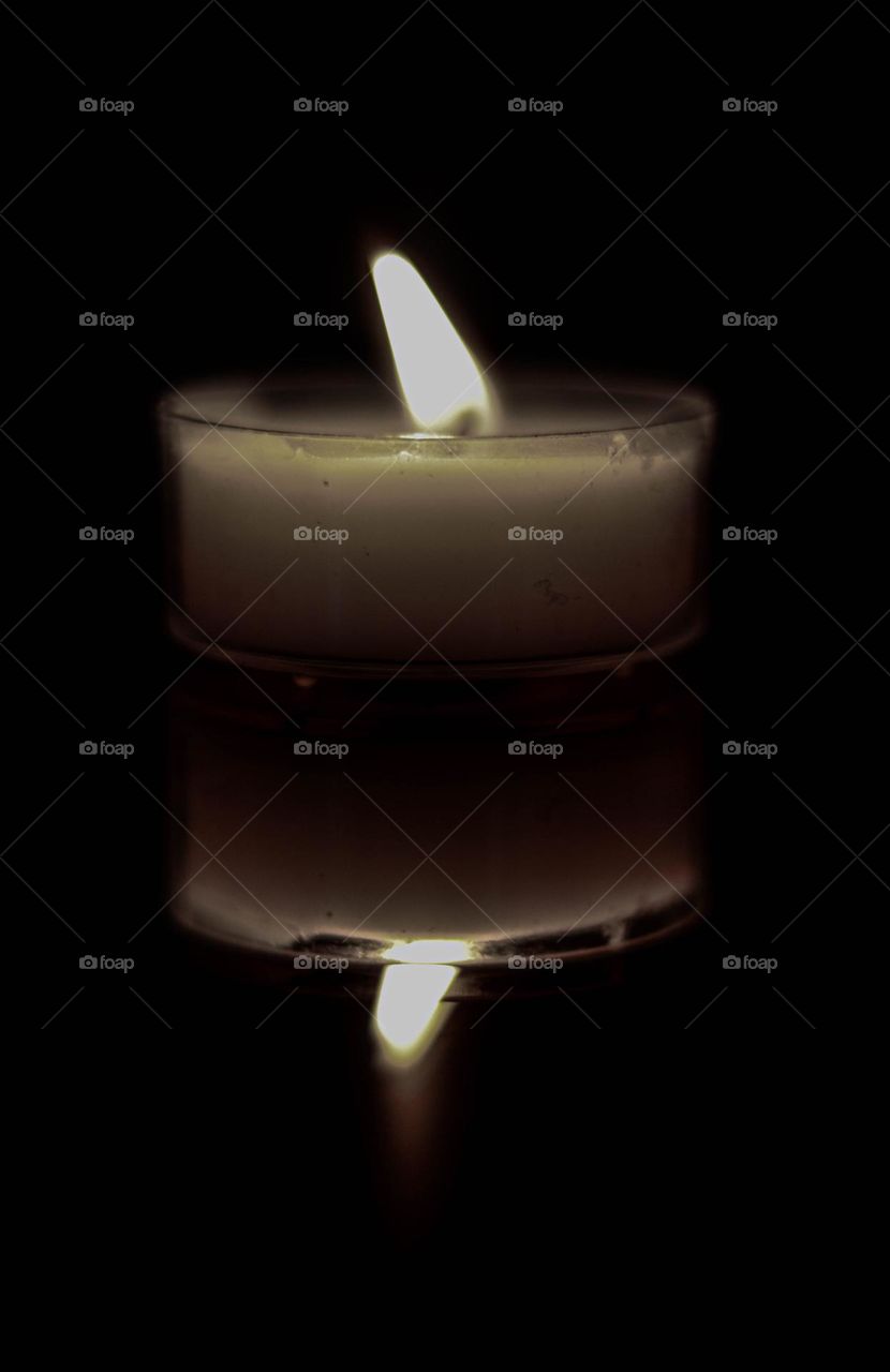 single candle burning