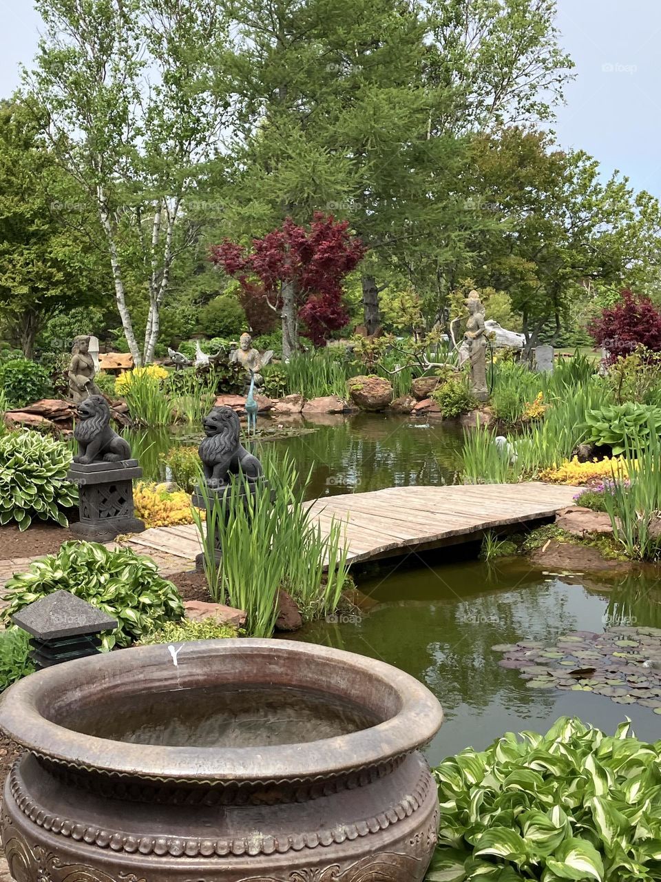 Beautiful landscaped garden, garden with a bridge, fairy garden in Canada 