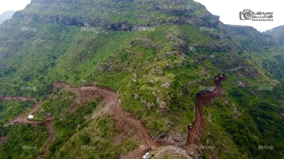 Glory be to God, the magnificent and picturesque view and the natural green trees are a view that is nothing more wonderful than it