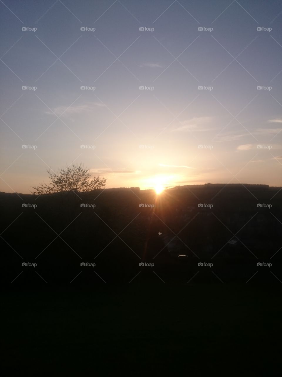 sunset in Jedburgh is nearly over behind the hills on April 21et 2019
