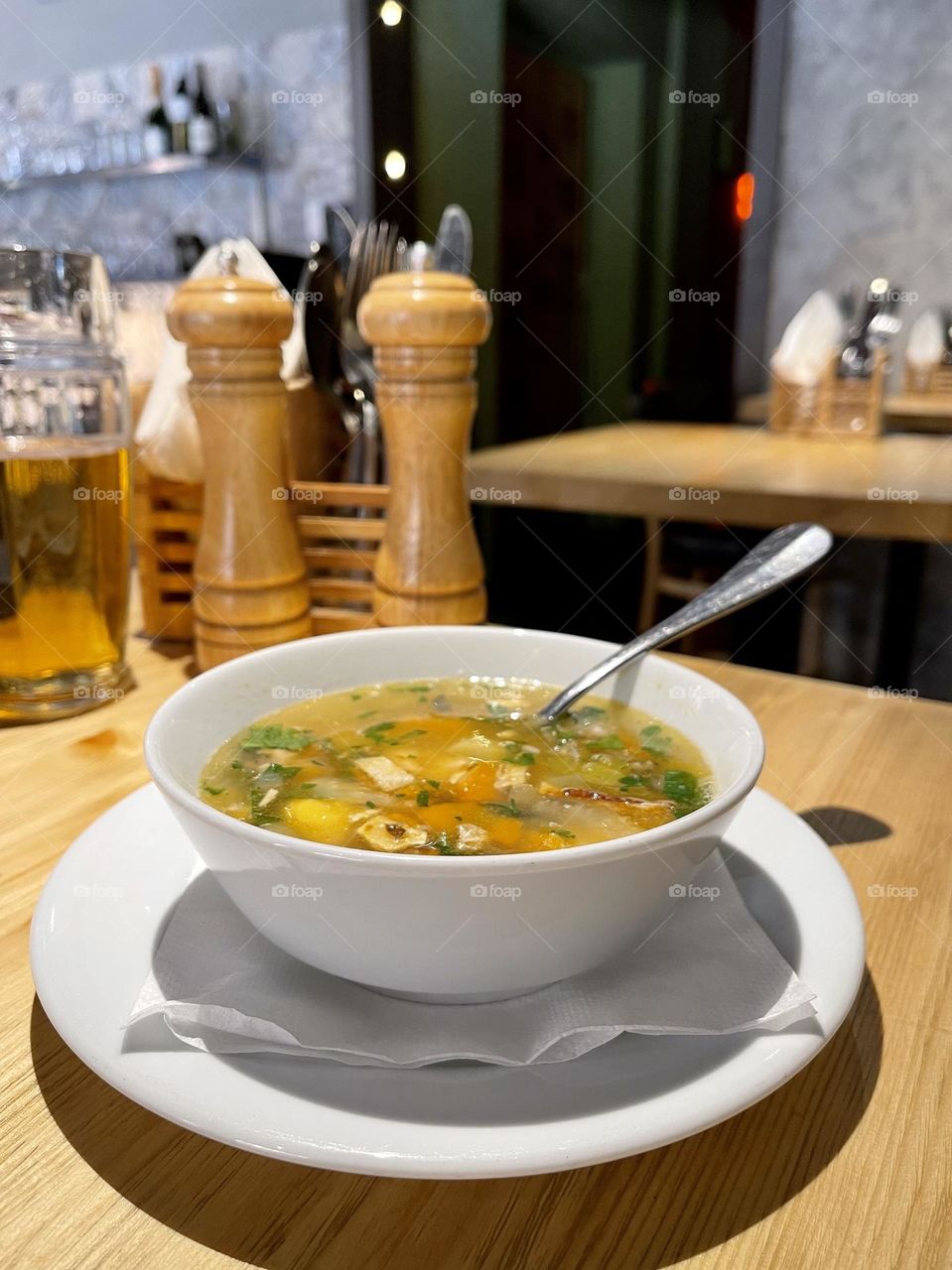 Seafood soup in the white bowl 