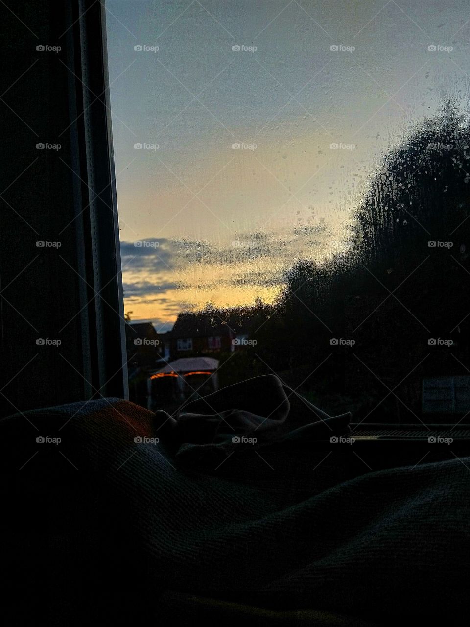 sunset through a dirty window