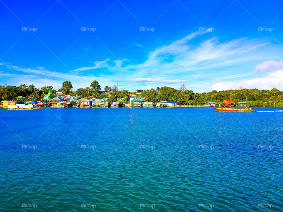 Beautiful view of the Rainbow Village in Tual City with itu blue bay