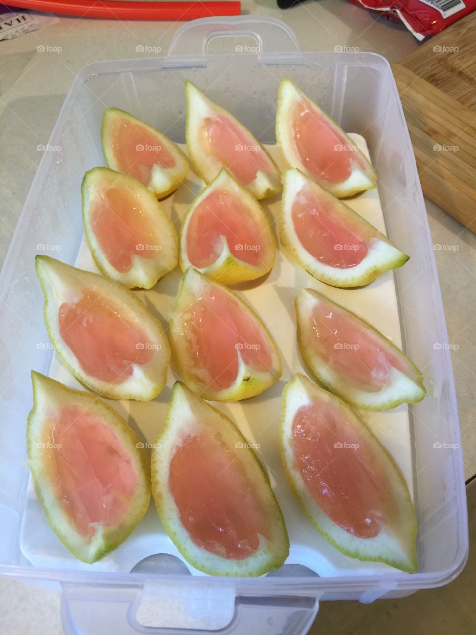 Pink Lemonade Jello Shots. Tried a new recipe. Very good and no shot glasses to wash. Used lemon rind to chill the shots in. Cute and easy