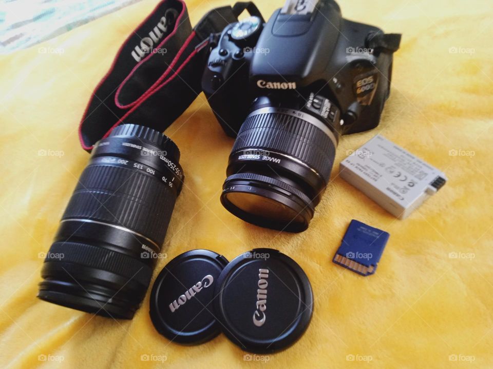 Camera in photography is a device for recording an image of an object on a light-sensitive surface, it is essentially a light-tight box with an aperture to admit light focused onto a sensitized film or plate