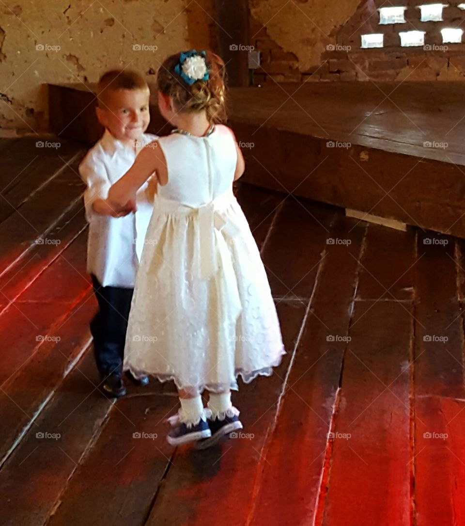 Boy and girl dancing together