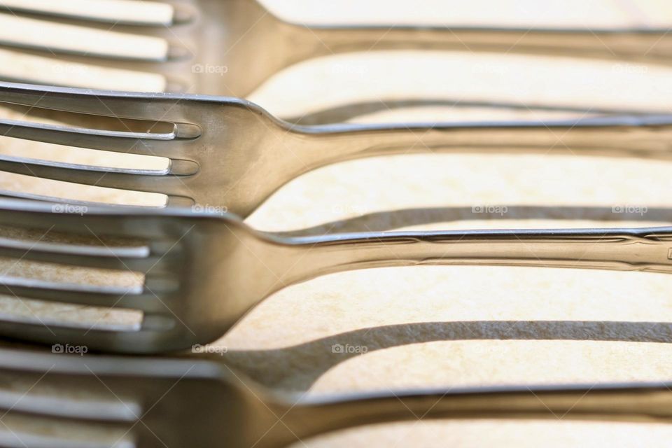 Lined up forks